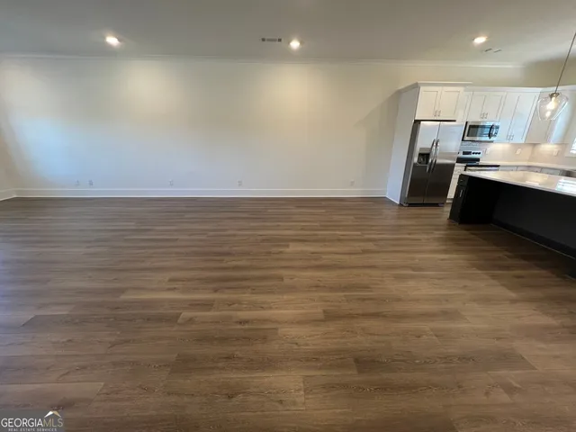 a view of room with cabinets