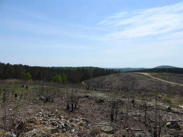 a view of mountain with lake view