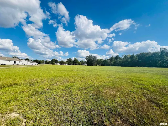 a view of an ocean and a building