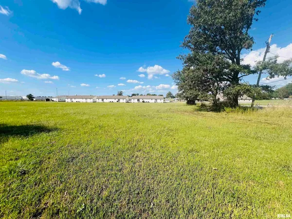 a view of an ocean and an outdoor space
