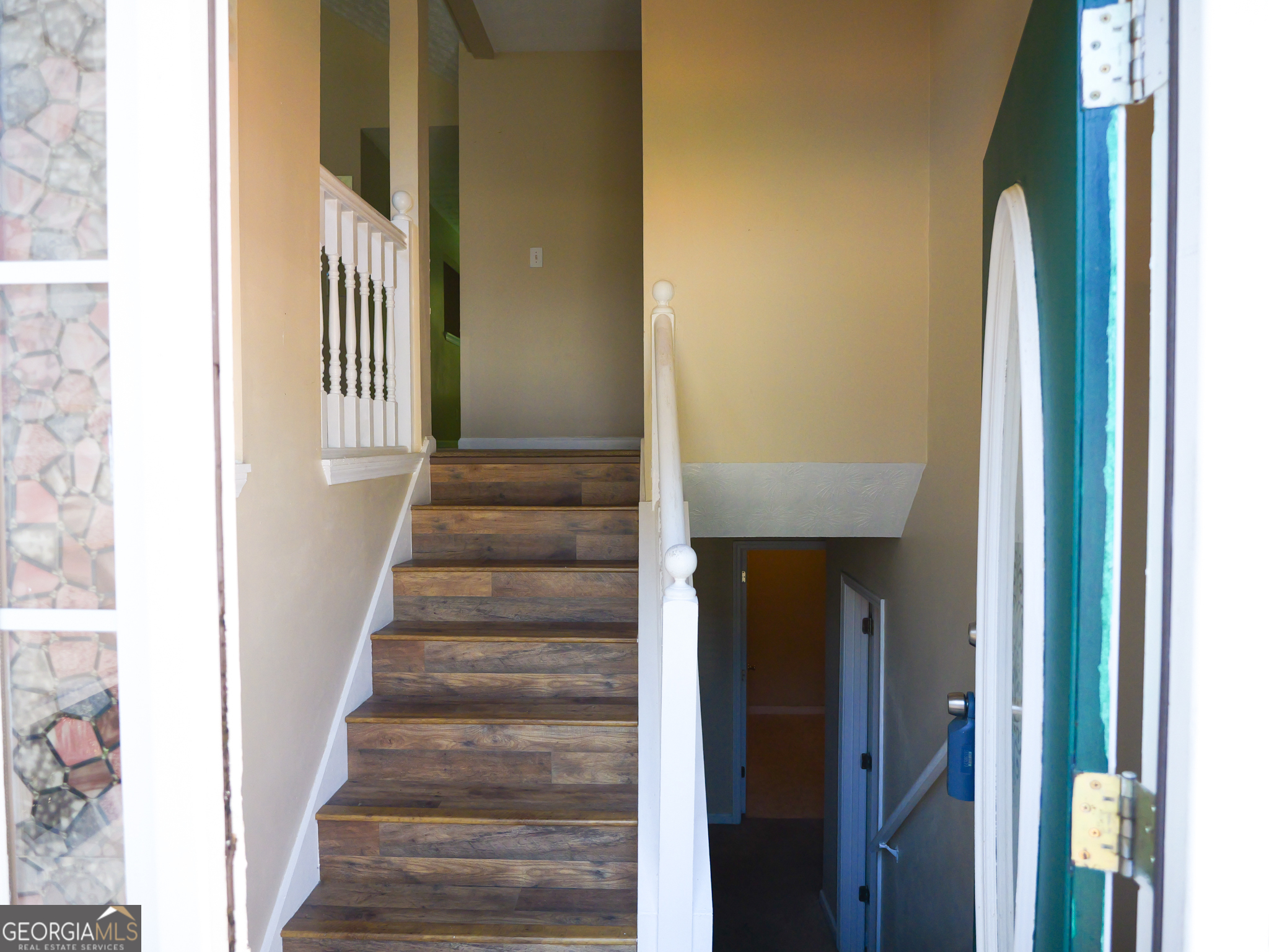 11036 Pebble Ridge Drive Hampton, GA 30228 - Photo 5 of 35 a view of a hallway with wooden floor and entryway