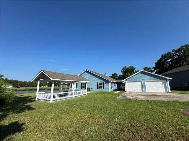 a house view with a garden space