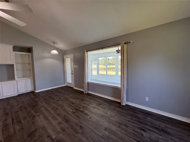 a view of an empty room and window