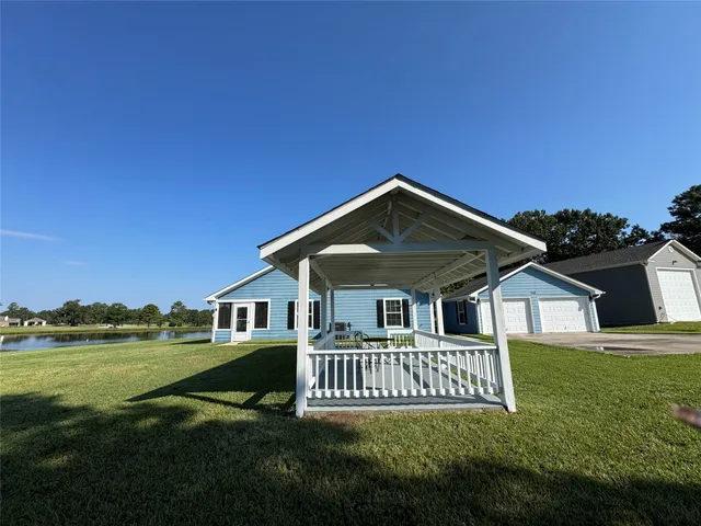 a house view with a garden space