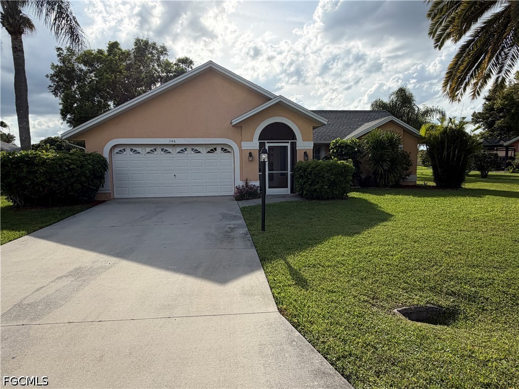 546 Whispering Wind Bend Lehigh Acres, FL 33974 - Photo 2 of 23