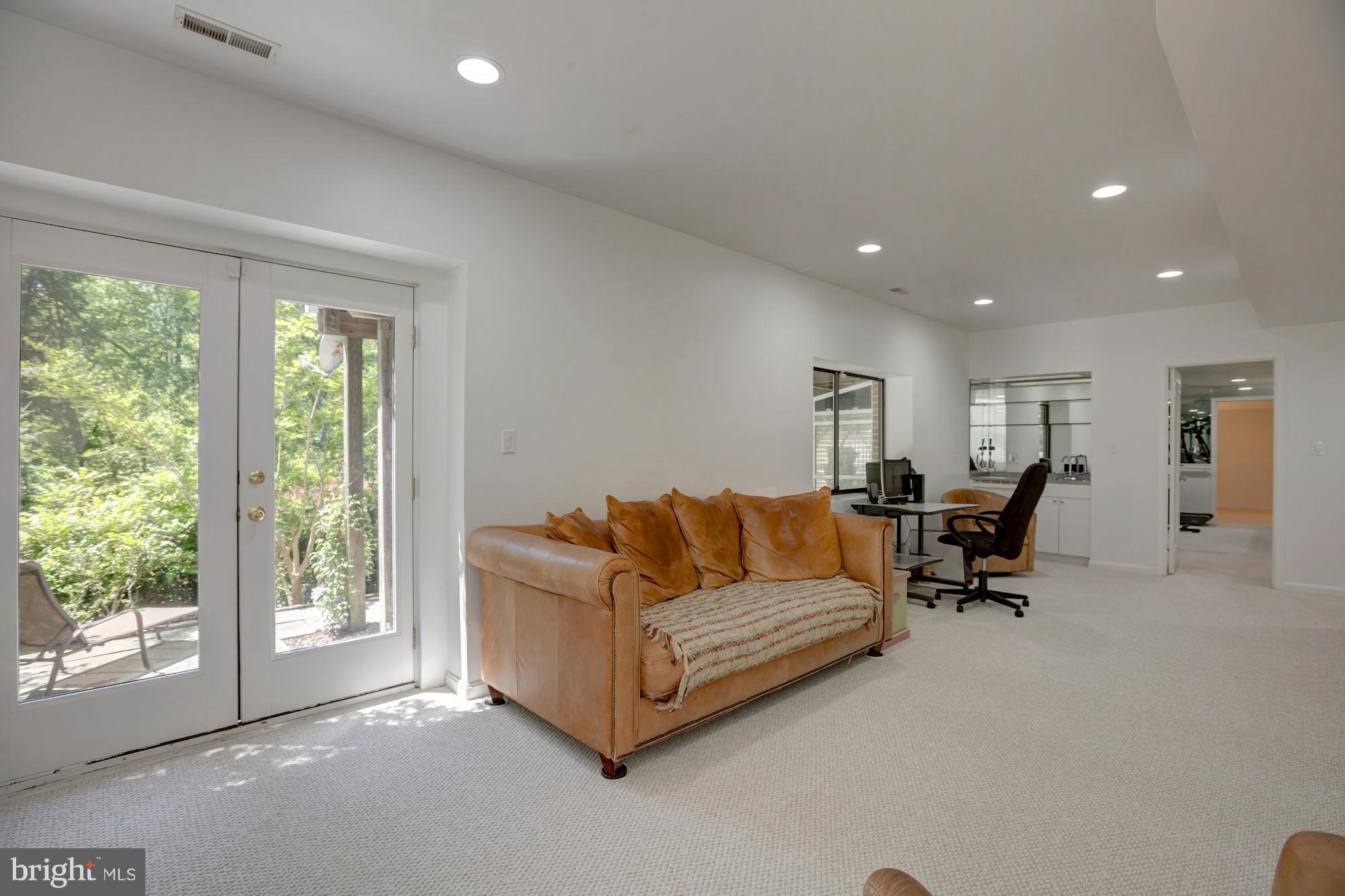 12329 Rivers Edge Drive Potomac, MD 20854 - Photo 22 of 29 Full daylight with walk out to patio