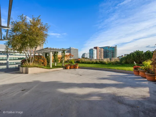 a view of a city street with a building