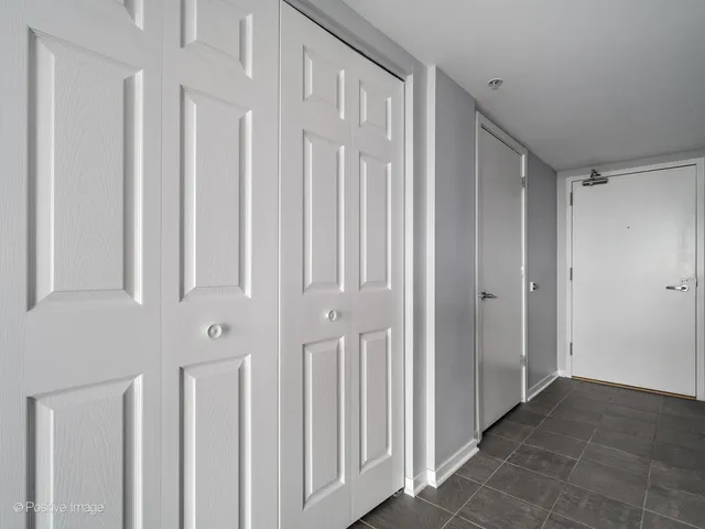 a view of a hallway with entryway