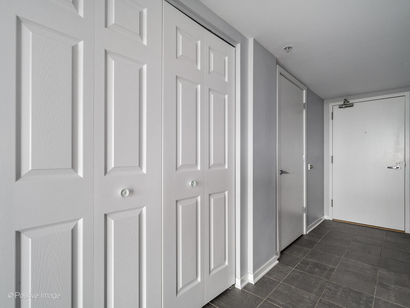 1640 Maple Avenue, Unit 804 Evanston, IL 60201 - Photo 3 of 27 a view of a hallway with entryway