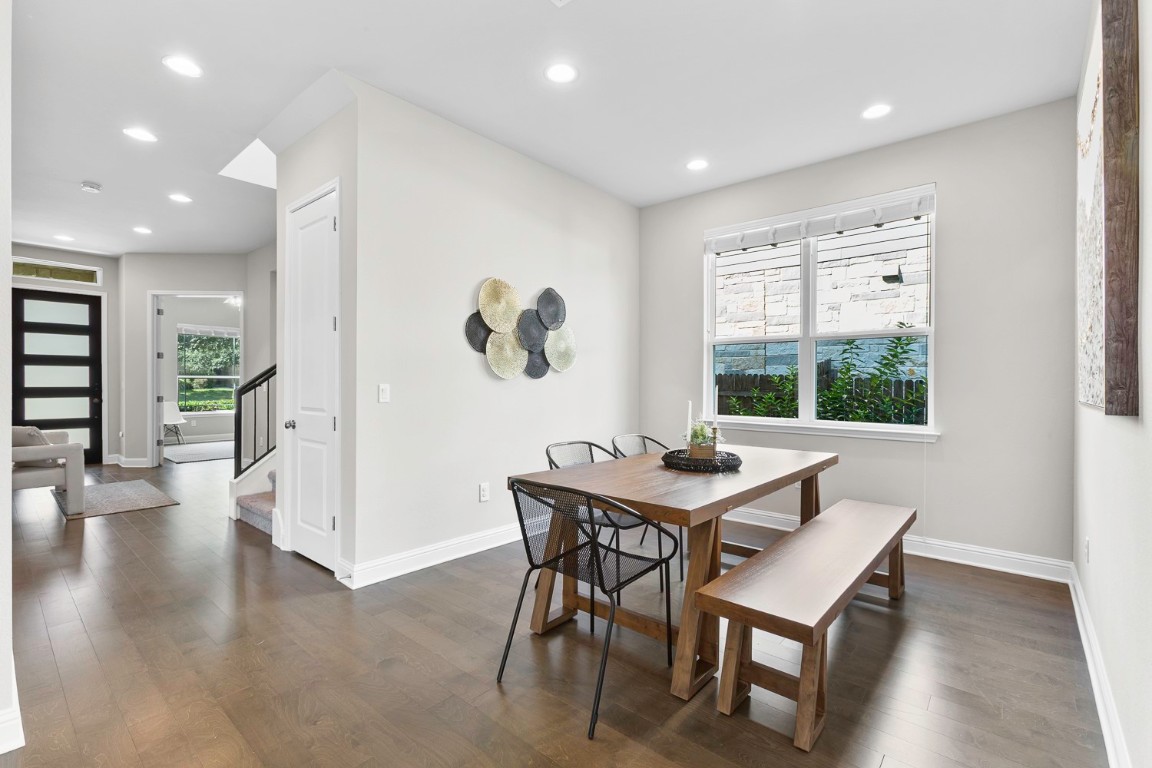 5000 Mandevilla Drive Austin, TX 78739 - Photo 14 of 40 a view of a dining room with furniture window and wooden floor