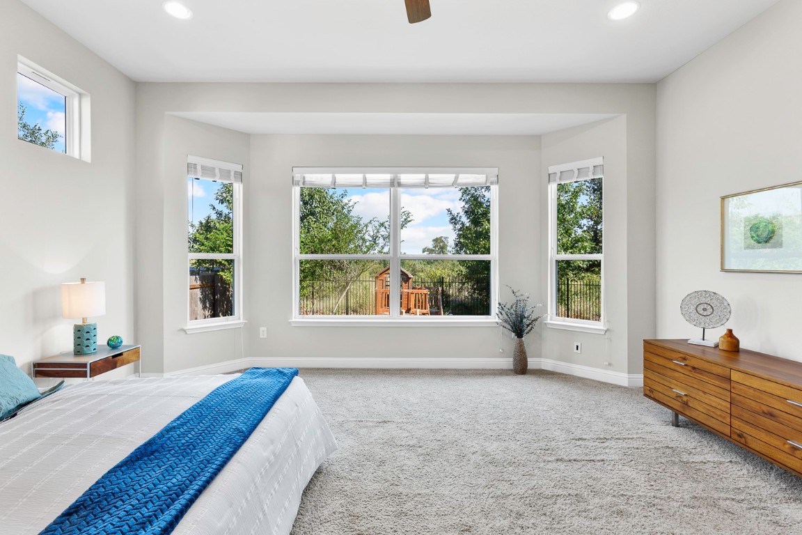 5000 Mandevilla Drive Austin, TX 78739 - Photo 17 of 40 a living room with furniture and a window