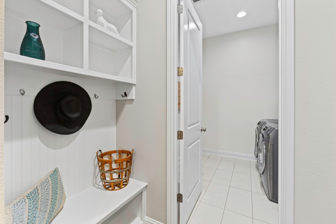 5000 Mandevilla Drive Austin, TX 78739 - Photo 26 of 40 a view of a hallway with washer and dryer