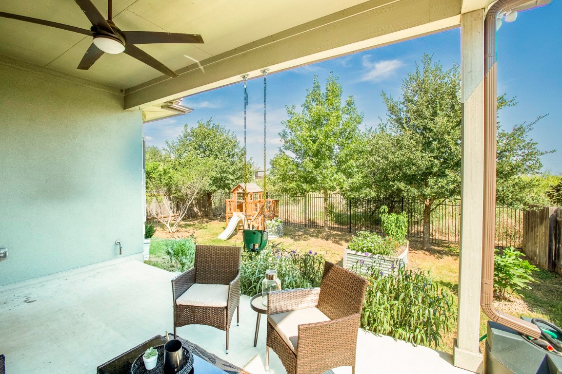 5000 Mandevilla Drive Austin, TX 78739 - Photo 37 of 40 a view of a patio with table and chairs and potted plants
