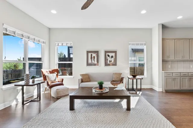 a living room with furniture and a table
