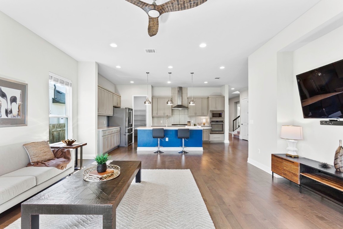 5000 Mandevilla Drive Austin, TX 78739 - Photo 6 of 40 a living room with furniture and a flat screen tv