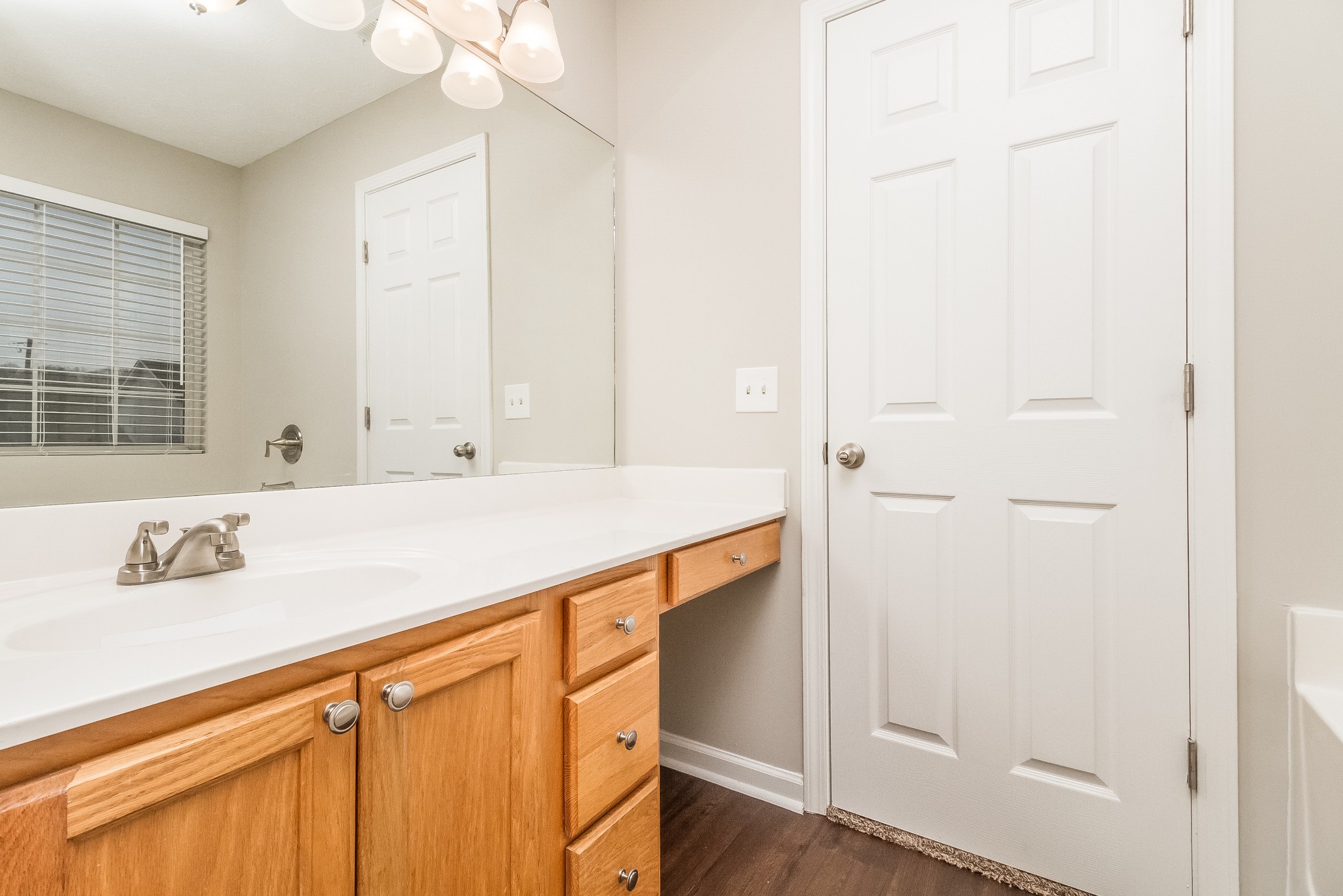Undisclosed Address Antioch, TN 37013 - Photo 12 of 17 a bathroom with a sink and a mirror