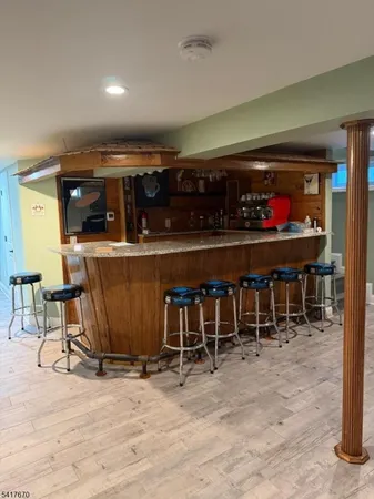 a view of a chairs and table in a room
