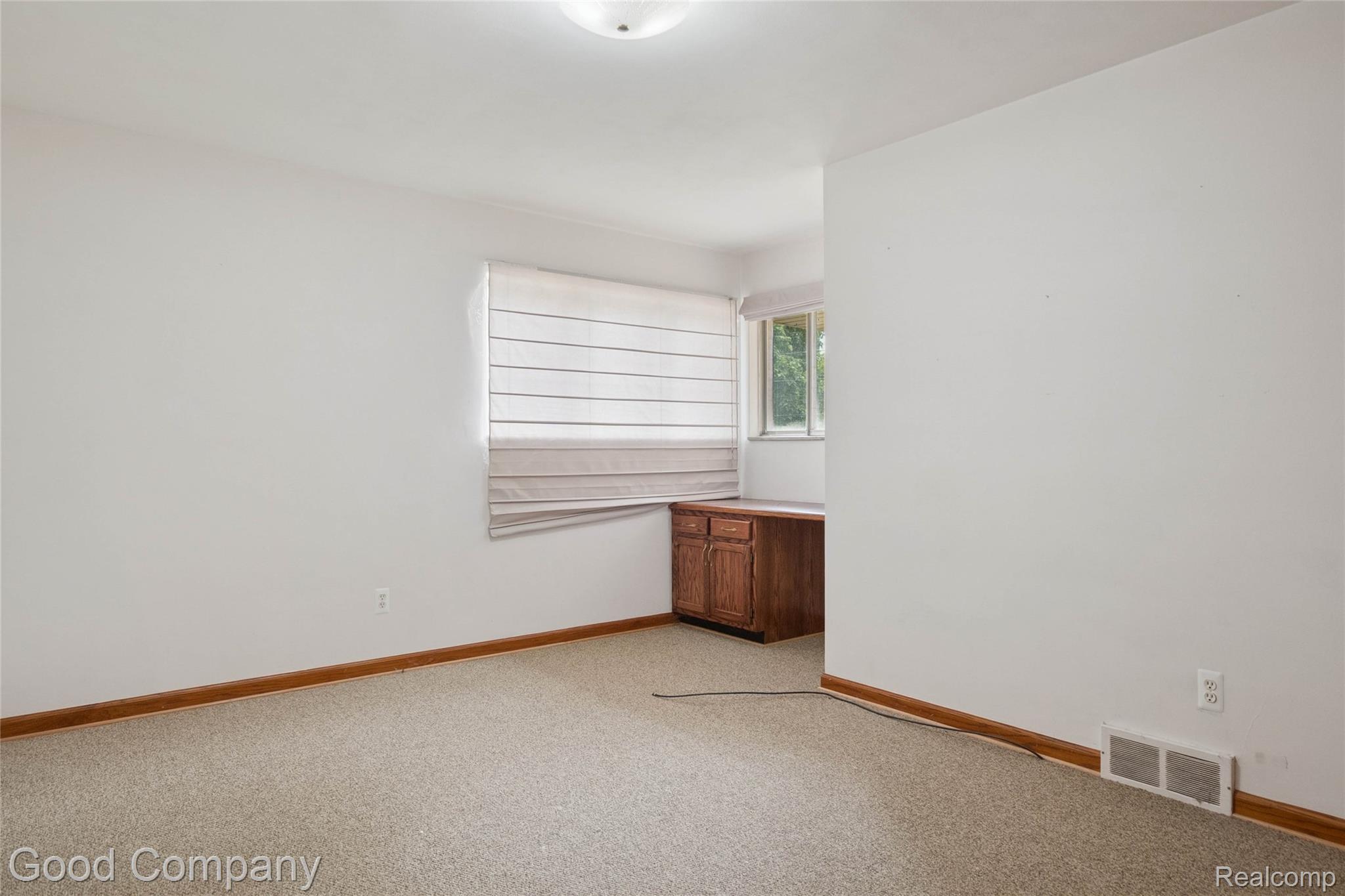 33920 Mulvey Road Fraser, MI 48026 - Photo 26 of 49 Empty room with baseboards and light colored carpet