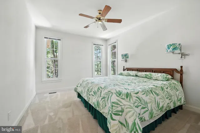 an aerial view of residential house with outdoor space and swimming pool