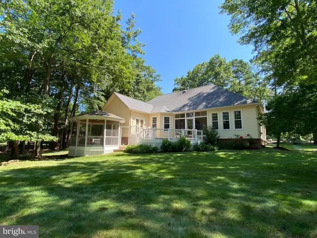 a view of a lake with a yard