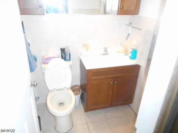 a bathroom with a toilet and a sink