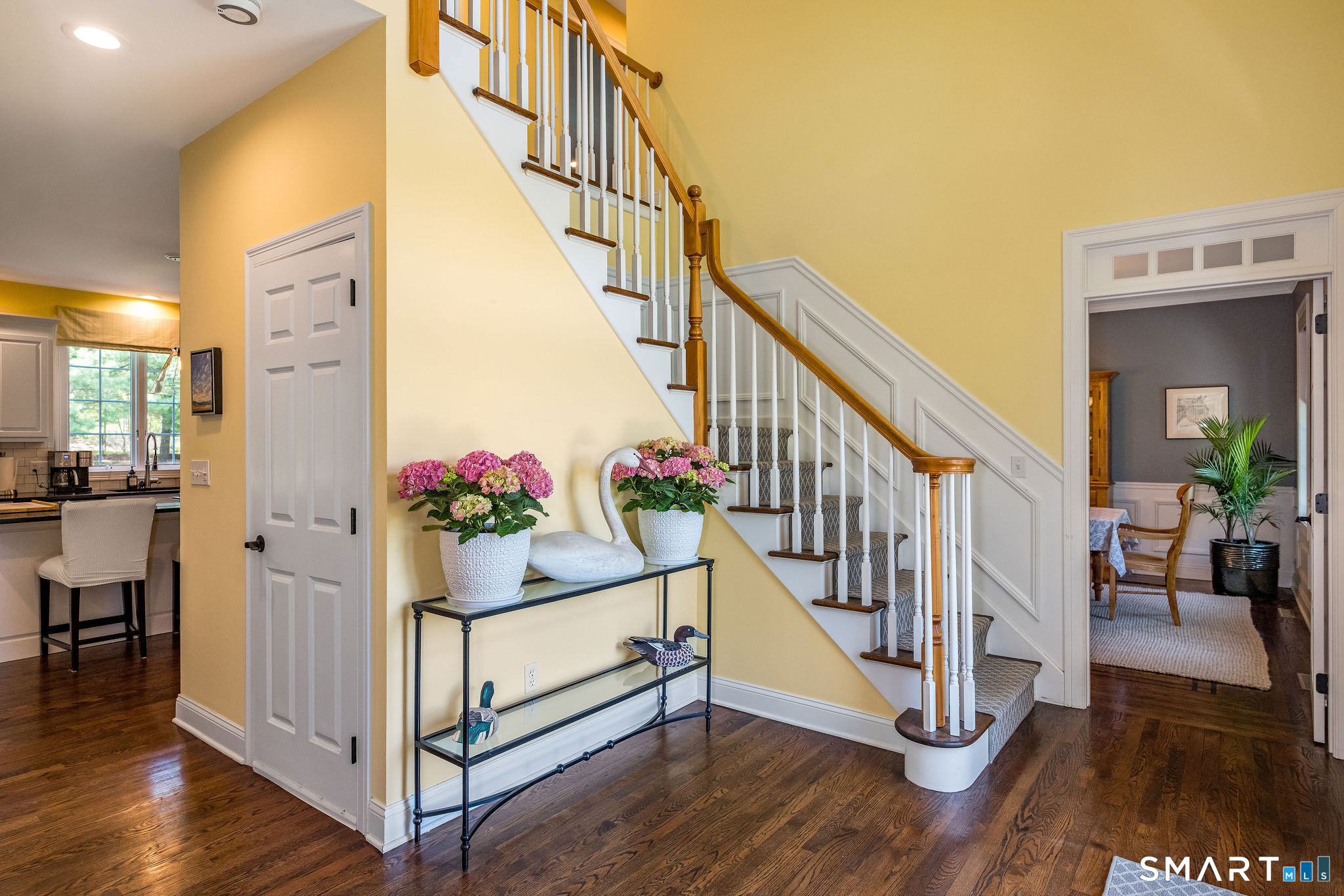 170 Devonshire Lane Madison, CT 06443 - Photo 5 of 39 a view of entryway with wooden floor and stairs