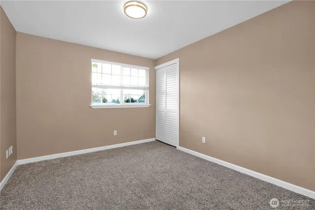 a view of a livingroom with wooden floor
