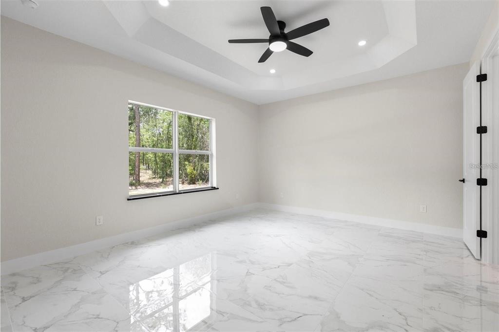 13619 Southwest 78th Place Dunnellon, FL 34432 - Photo 14 of 31 a view of an empty room with a window