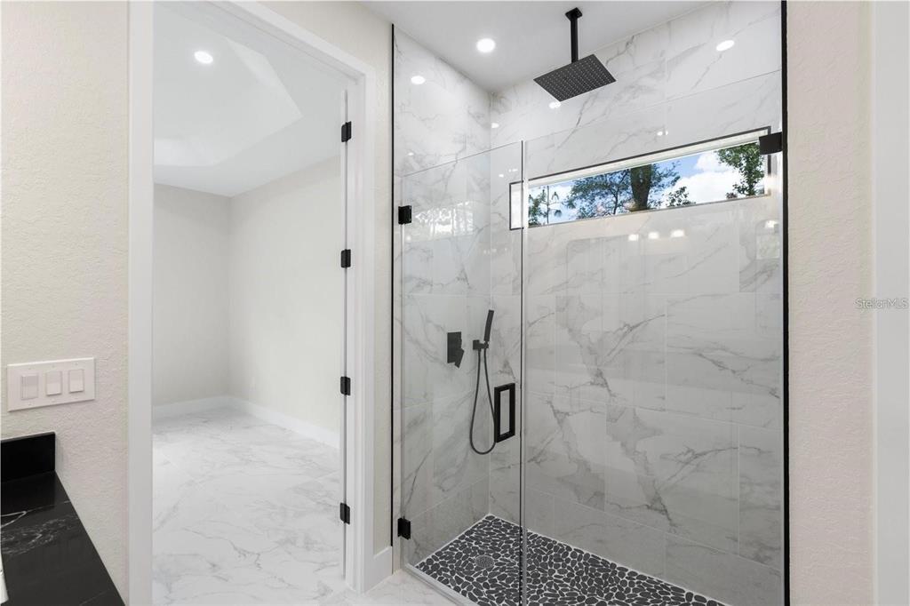 13619 Southwest 78th Place Dunnellon, FL 34432 - Photo 20 of 31 a bathroom with a shower