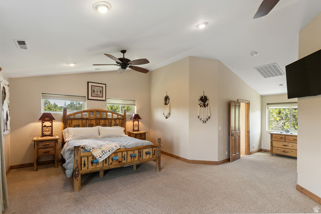 755 South Zion Ridge Drive Orderville, UT 84758 - Photo 66 of 84 Bedroom with lofted ceiling, a ceiling fan, and light colored carpet