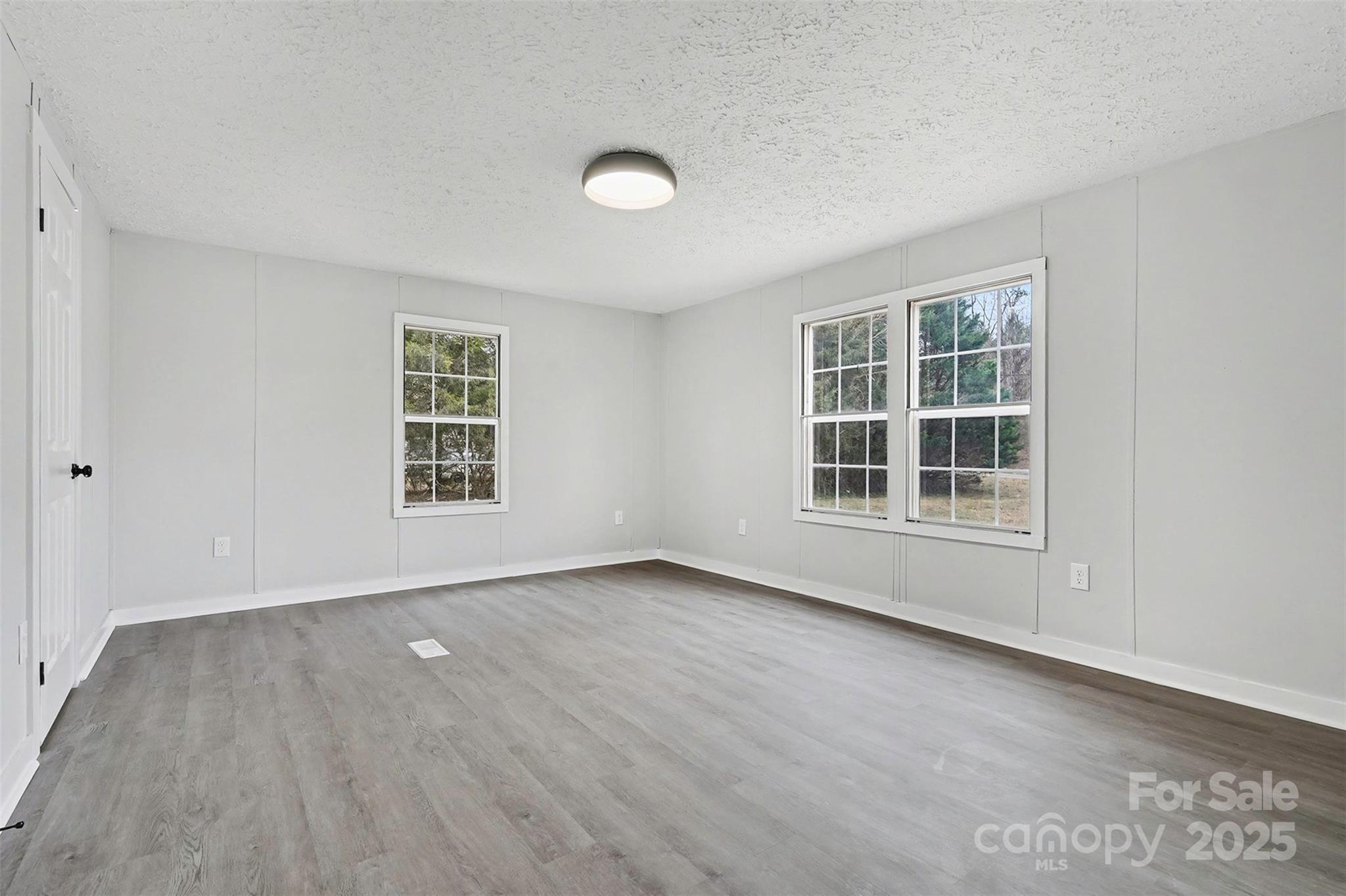 115 Lakeview Lane China Grove, NC 28023 - Photo 16 of 32 an empty room with windows