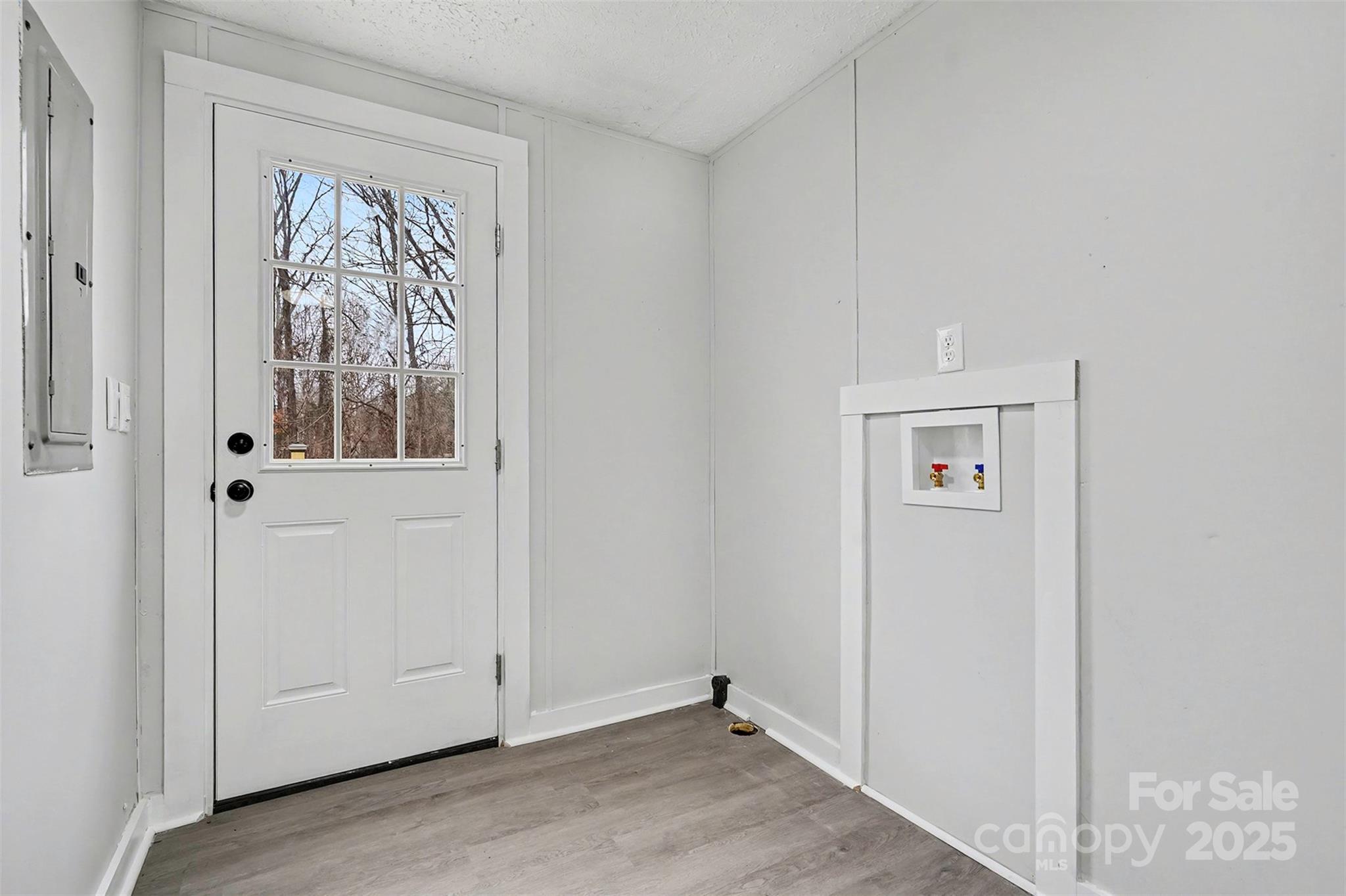 115 Lakeview Lane China Grove, NC 28023 - Photo 21 of 32 a view of front door with wooden floor