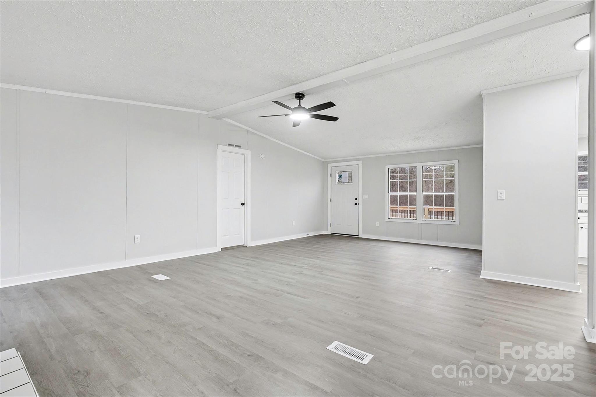 115 Lakeview Lane China Grove, NC 28023 - Photo 8 of 32 wooden floor in an empty room with a window