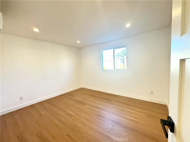 a bathroom with a toilet sink and shower