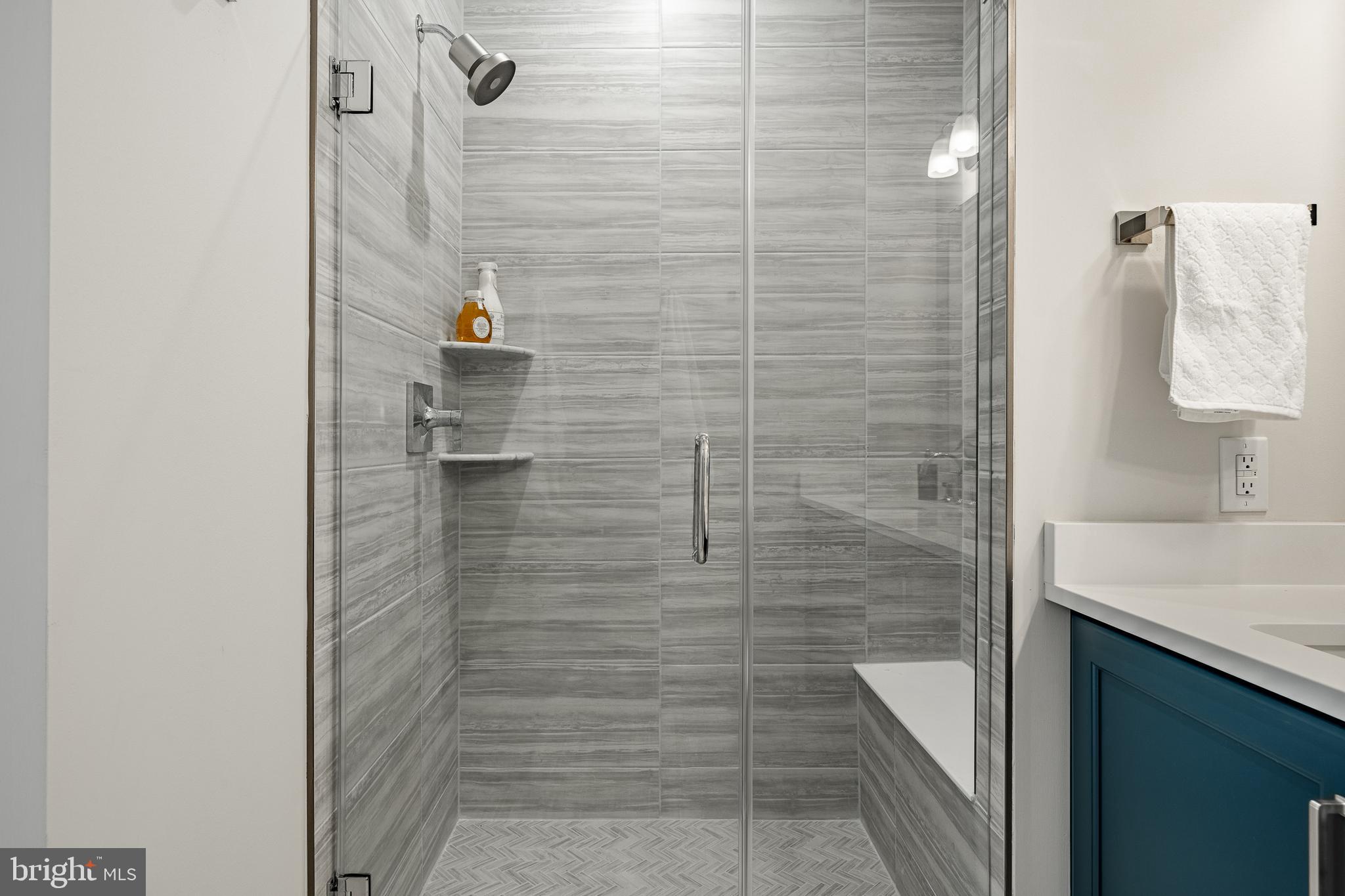 581 Trifecta Road Downingtown, PA 19335 - Photo 24 of 45 a bathroom with a sink and shower