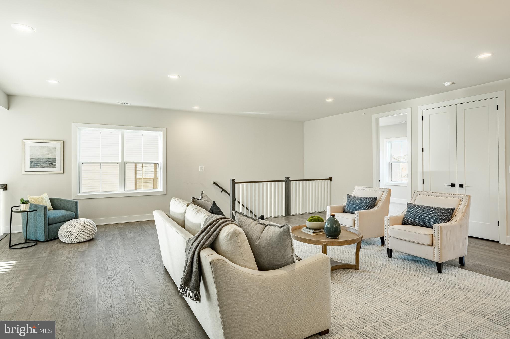 581 Trifecta Road Downingtown, PA 19335 - Photo 29 of 45 a living room with furniture and wooden floor