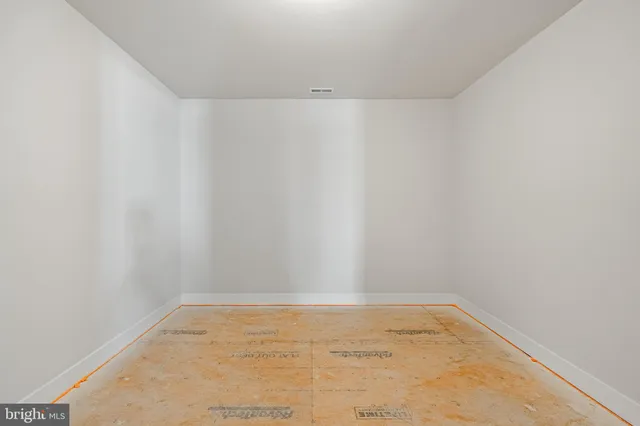 a view of living room with furniture and rug