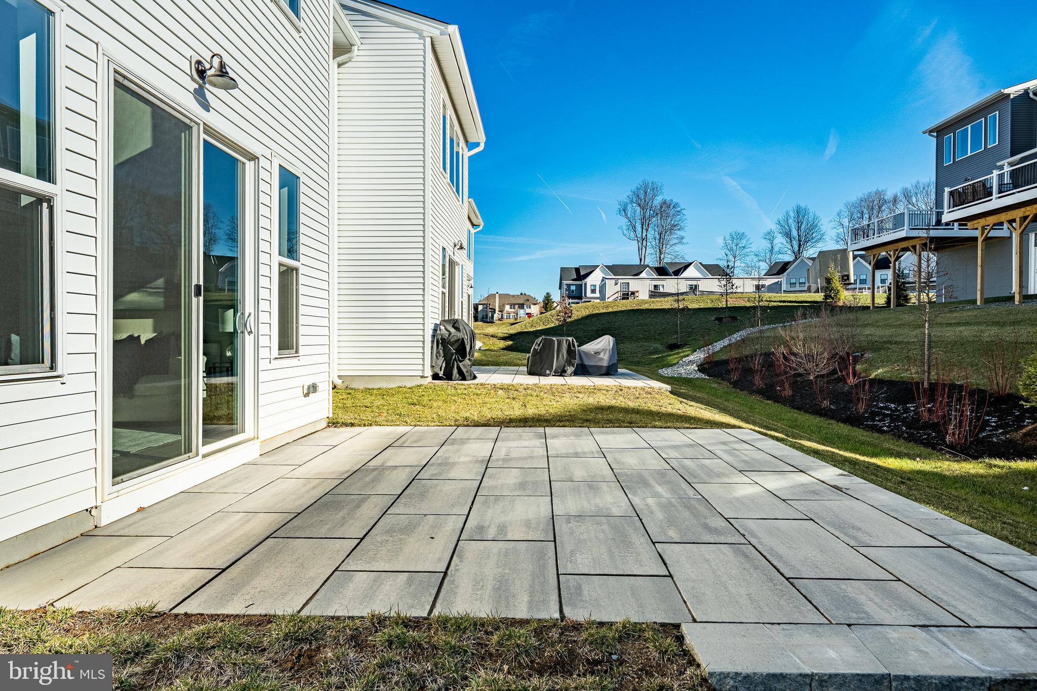 581 Trifecta Road Downingtown, PA 19335 - Photo 44 of 45 a view of a swimming pool with a lounge chairs