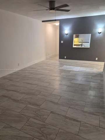 a view of a livingroom with a bathroom