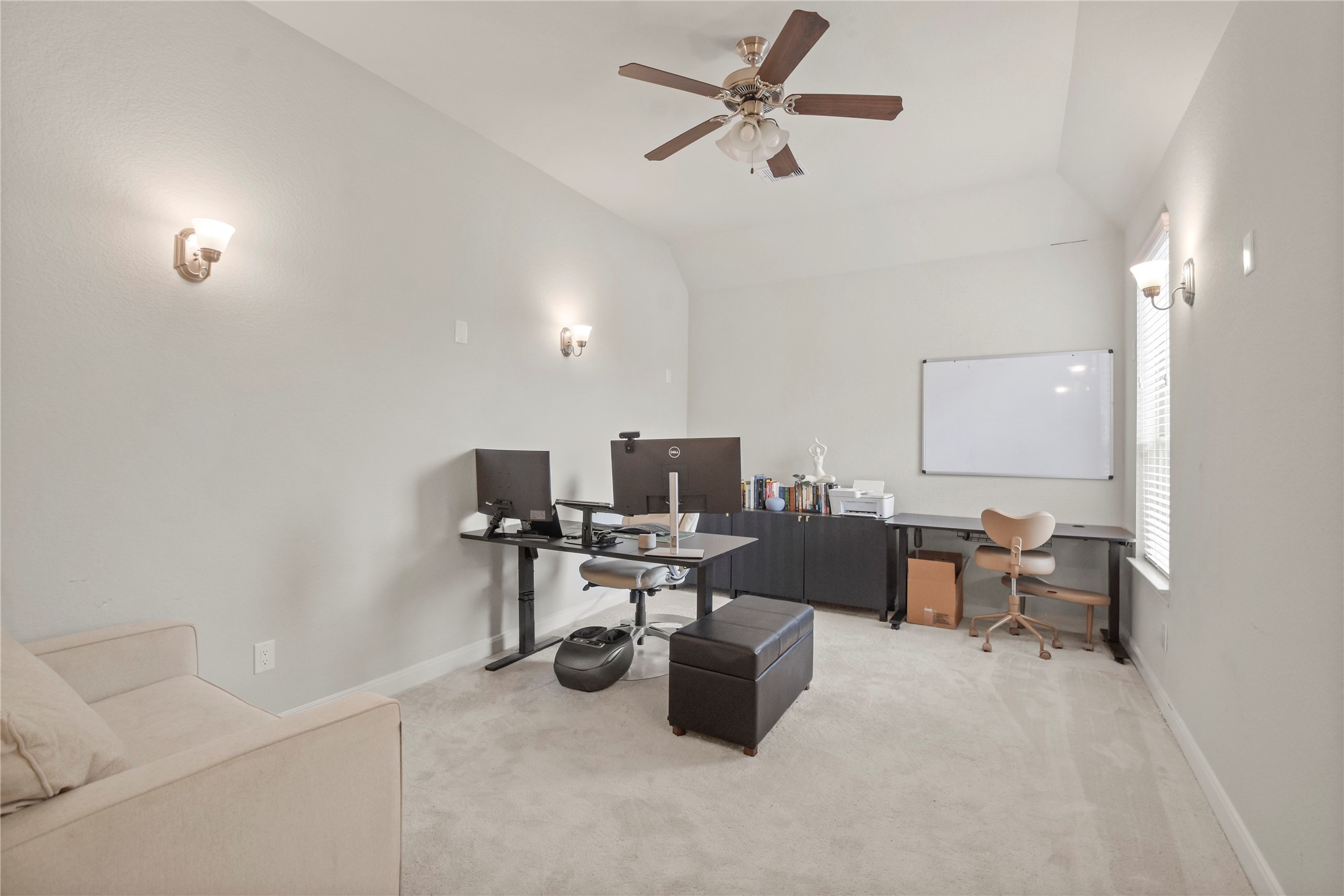 24727 Horsetooth Dr Spring Spring, TX 77373 - Photo 16 of 27 With high ceilings, soft lighting, and ample space for work or relaxation, this room adapts to fit your lifestyle effortlessly.