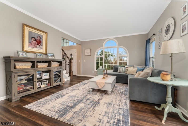 7 Maple Springs Road Pittstown, NJ 08867 - Photo 11 of 41 a living room with furniture and a flat screen tv