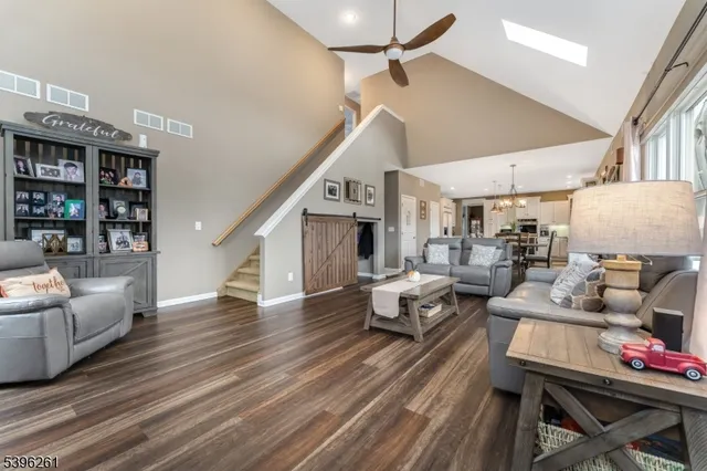 a bathroom with a tub a toilet and a shower