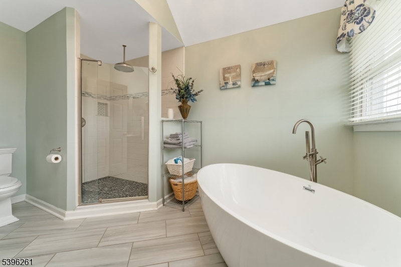 7 Maple Springs Road Pittstown, NJ 08867 - Photo 30 of 41 a bathroom with a tub a toilet and a shower