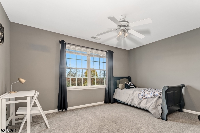 7 Maple Springs Road Pittstown, NJ 08867 - Photo 32 of 41 a bedroom with a bed and a window