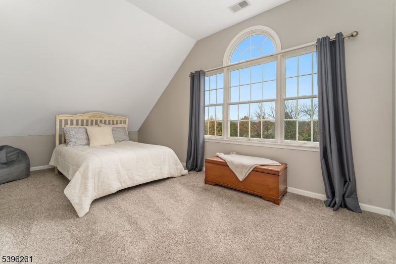 7 Maple Springs Road Pittstown, NJ 08867 - Photo 35 of 41 a bedroom with a bed and a large window