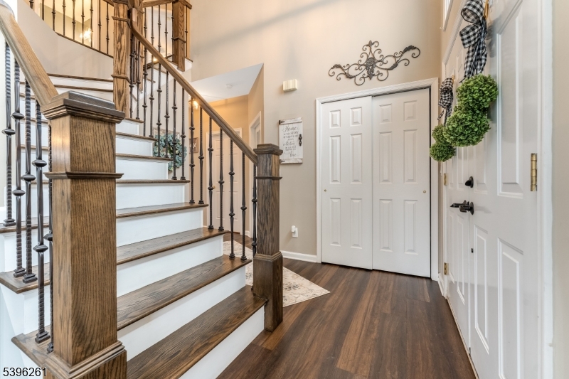 7 Maple Springs Road Pittstown, NJ 08867 - Photo 6 of 41 a view of entryway with wooden floor and stairs