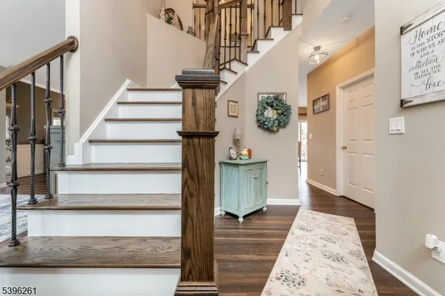 a bathroom with a toilet a sink and shower