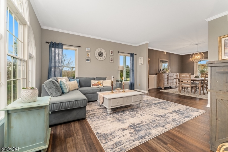 7 Maple Springs Road Pittstown, NJ 08867 - Photo 10 of 41 a living room with furniture and a wooden floor