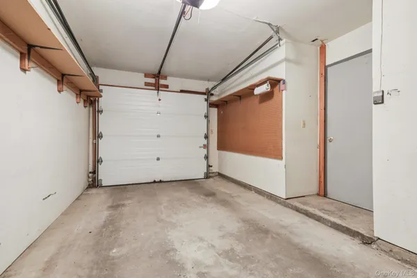 a view of a balcony with wooden floor