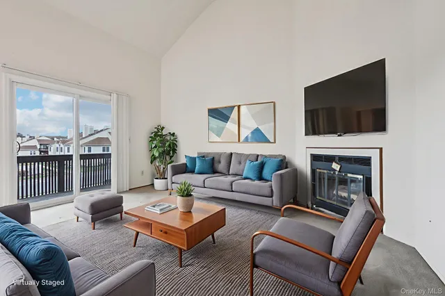 an empty room with sliding door and window